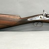 A large iron barreled percussion blunderbuss, 18 inch bellmouth barrel, the plated side lock marked 'Trulock & Harris, 1858 - 1862', participated in London Exhibition 1862, steel furniture wood rammer